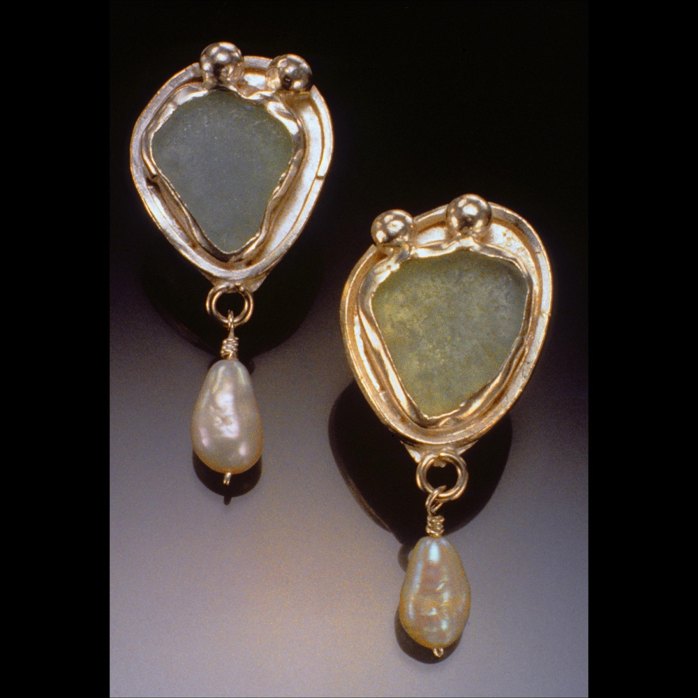 Sea Glass earrings

.75&amp;quot; x 1.5&amp;quot; x .25&amp;quot;