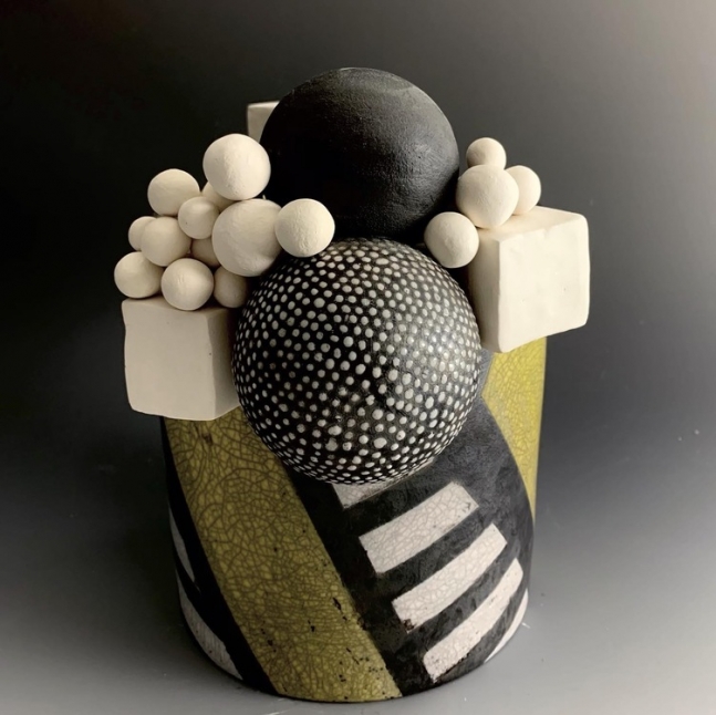 Contrast Raku vase, epoxy, and porcelain&nbsp;